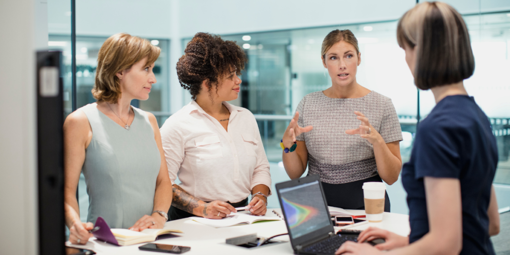 Professional women helping each other