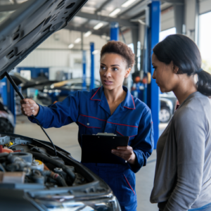 woman mechanic with customer