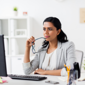 woman sitting at her desk