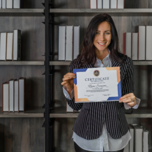 woman showing of her certificate